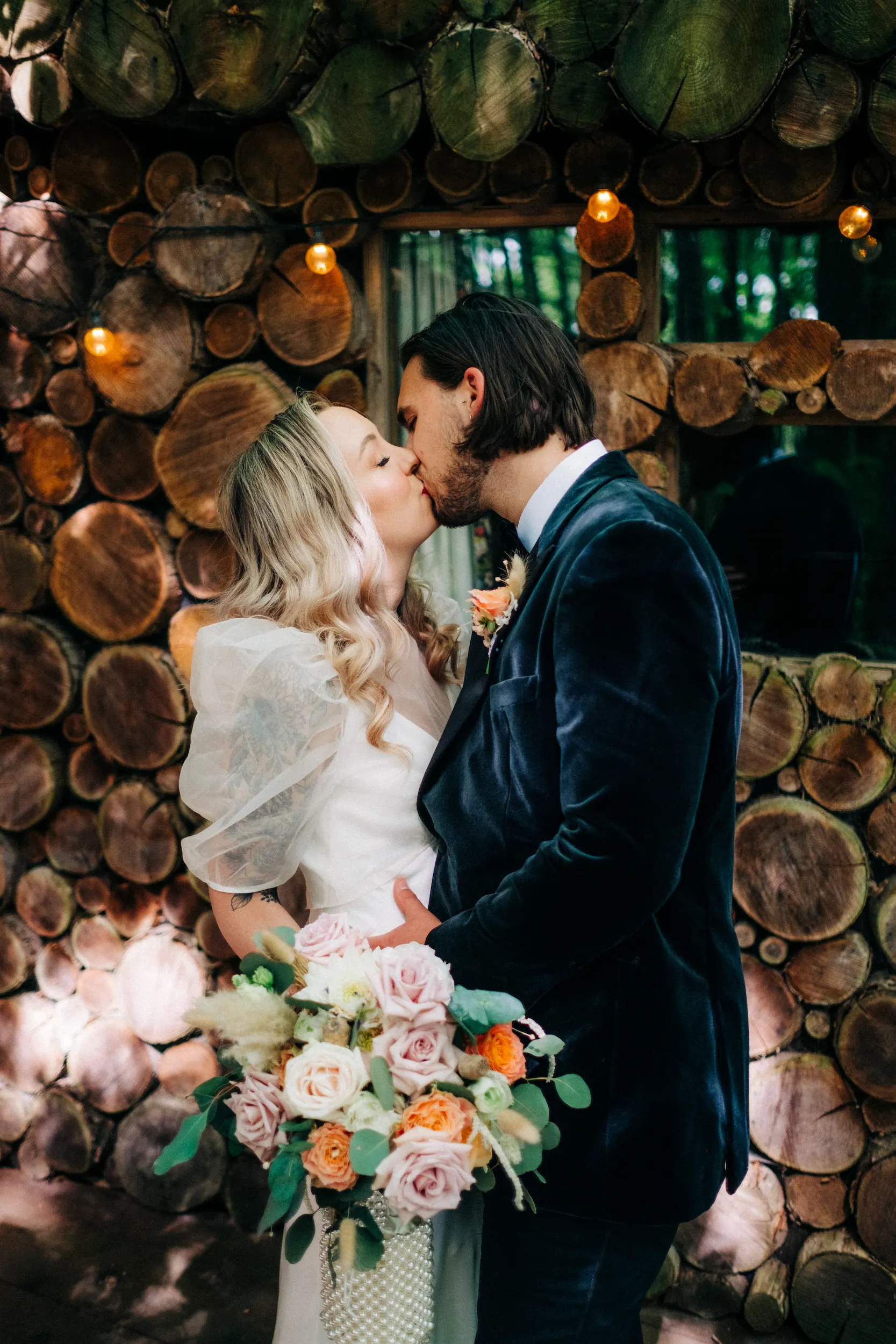 the dreys woodland wedding photographer Kent — couple kissing