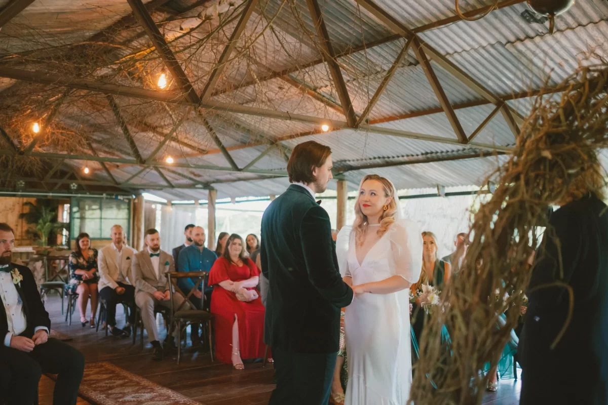 bride and groom during ceremony at the dreys in kent wedding venue woods