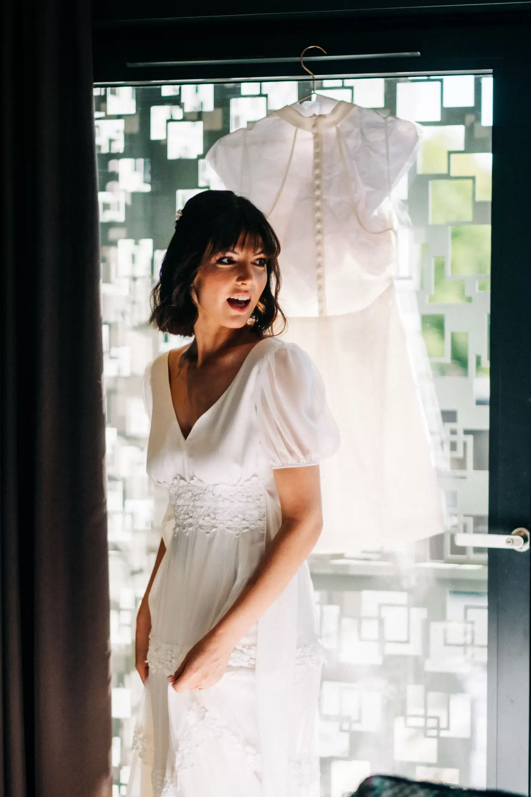 bride getting ready candid shot during bridal prep 