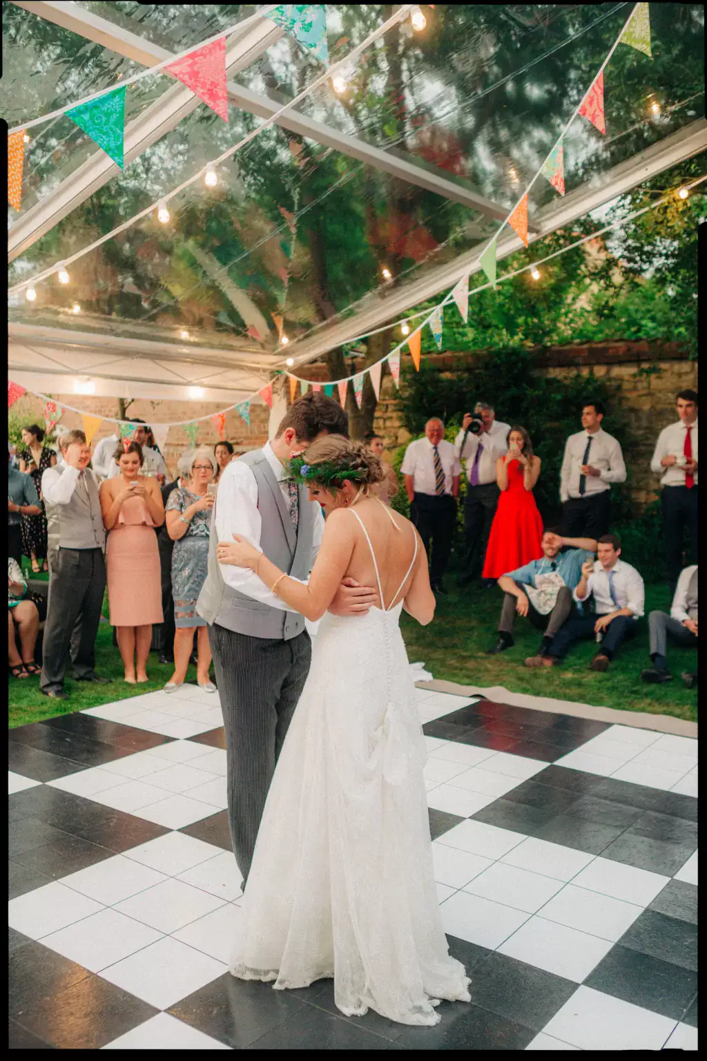 Couple dancing in parents back garden backyard