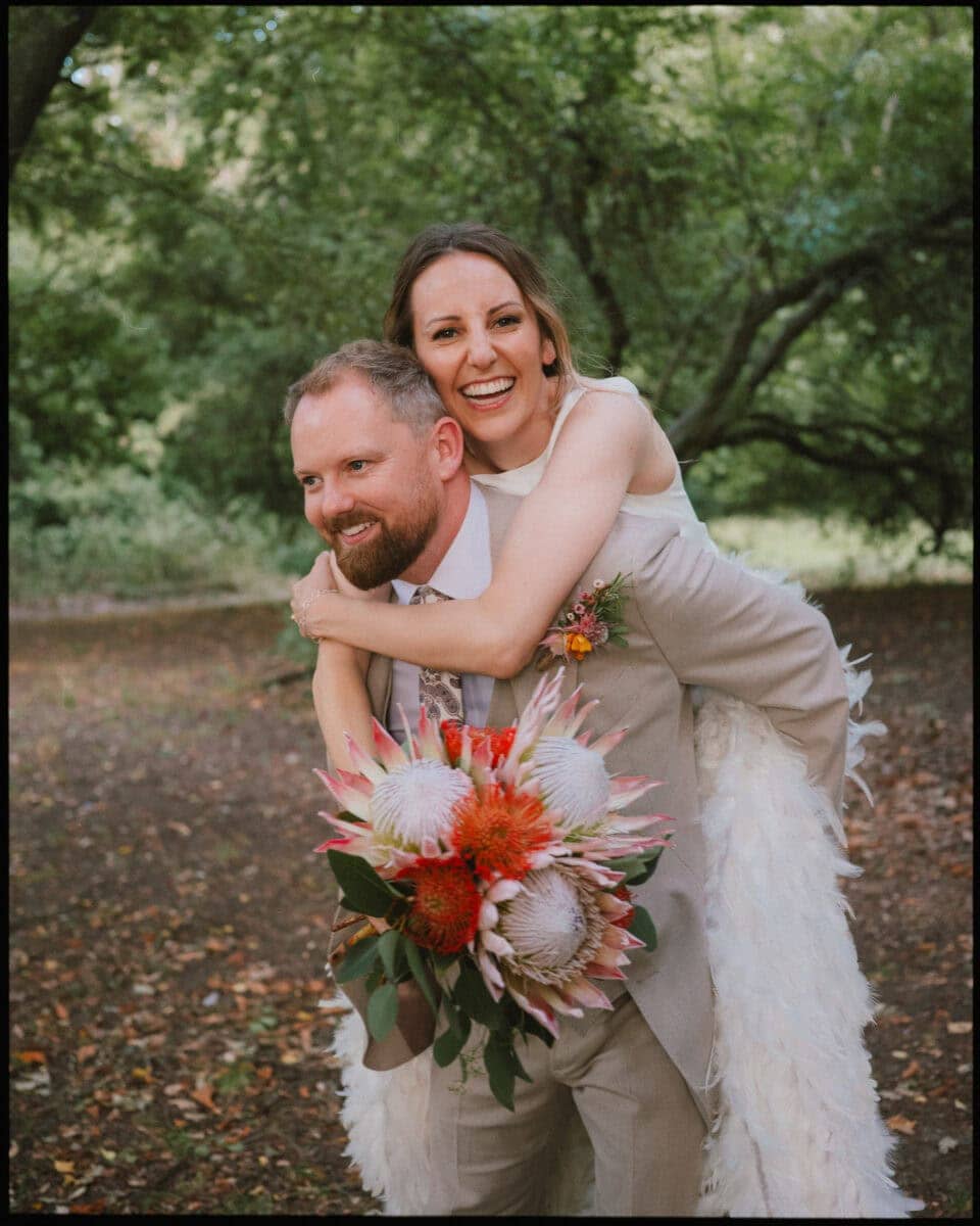 The Depot N7 wedding photographer London — couple playful shot in the park