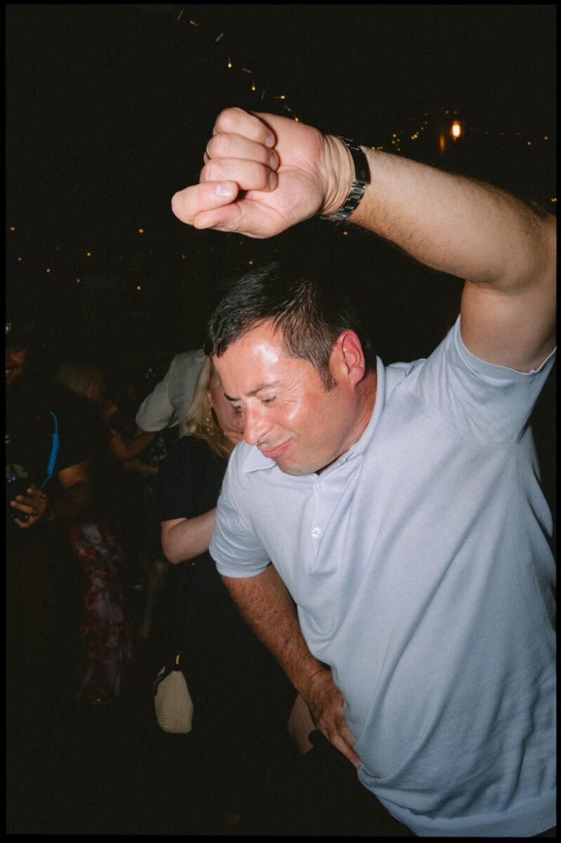 The Depot N7 wedding photographer London — uncle dancing on dancefloor