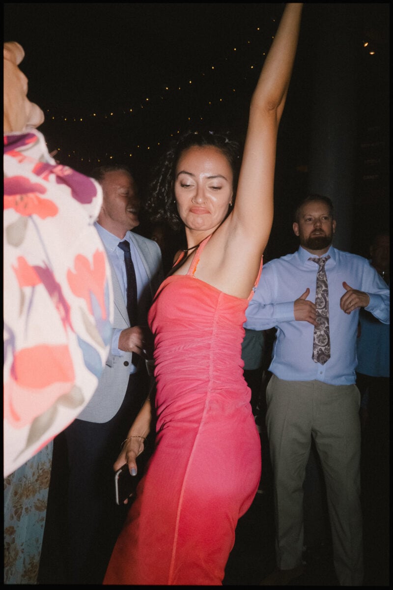 The Depot N7 wedding photographer London — guest pulling shapes on dancefloor