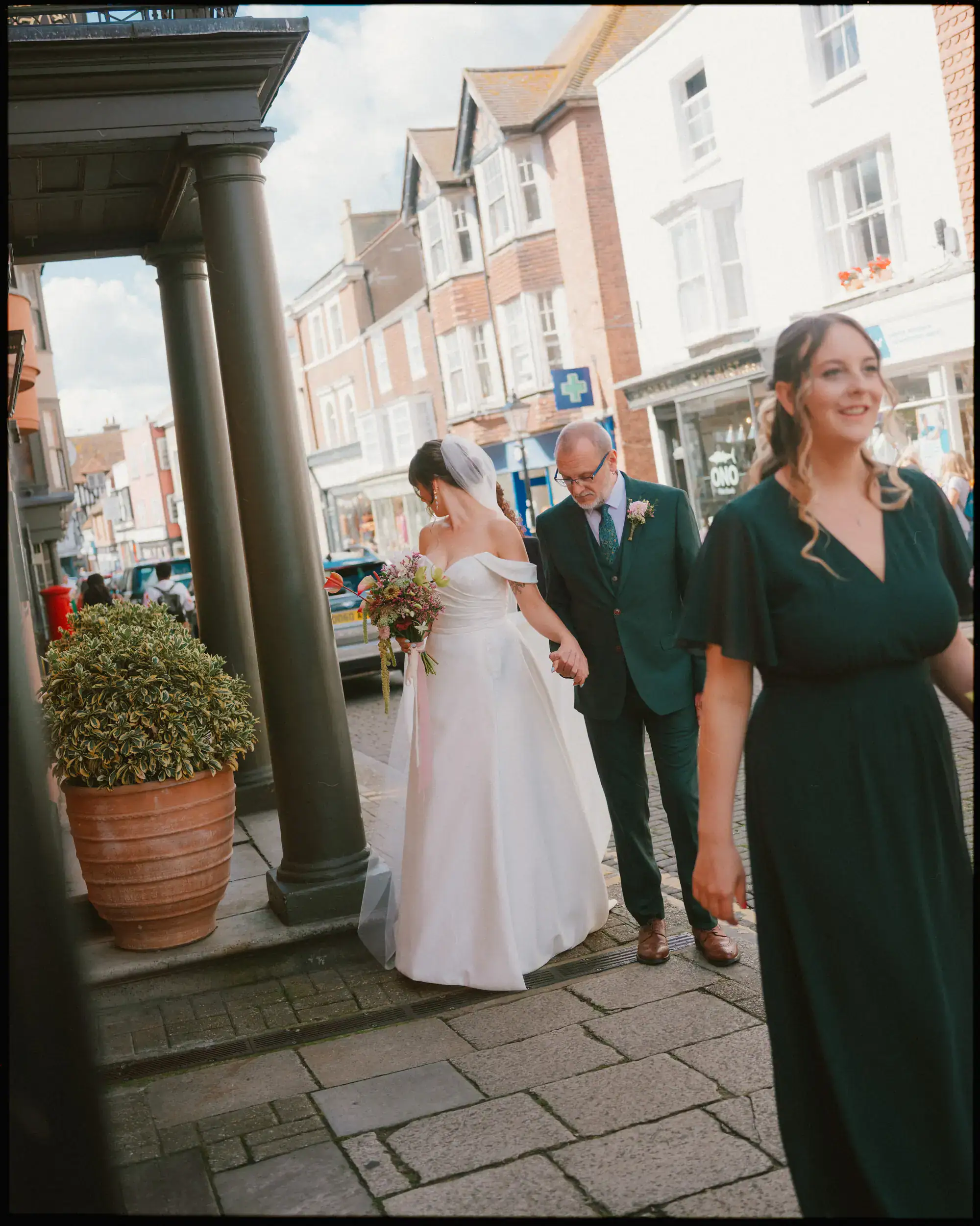 bride leaving the george in rye for the town hall ceremony