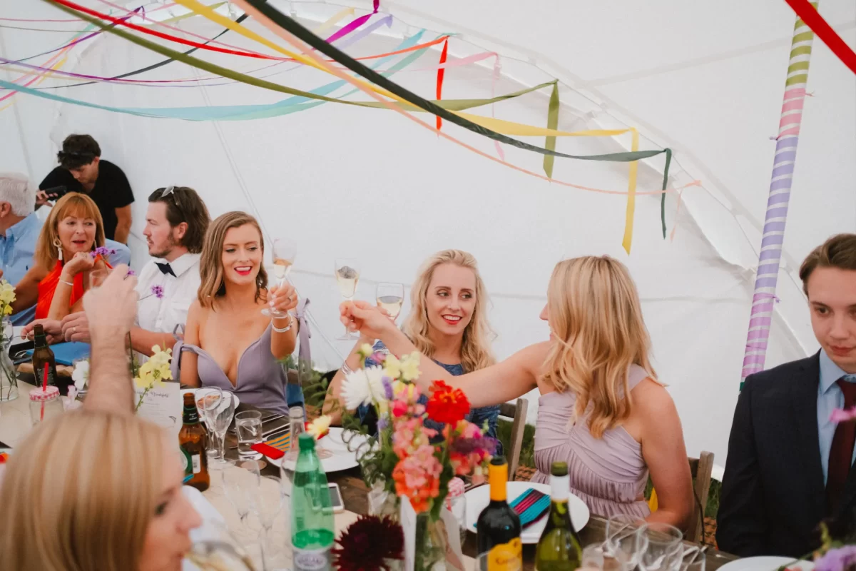 Guests enjoying the wedding breakfast at The Paper Mill woodland wedding venue in Kent.