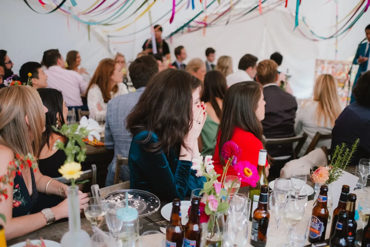 guests laughing at exclusive woodland wedding venue paper mill kent