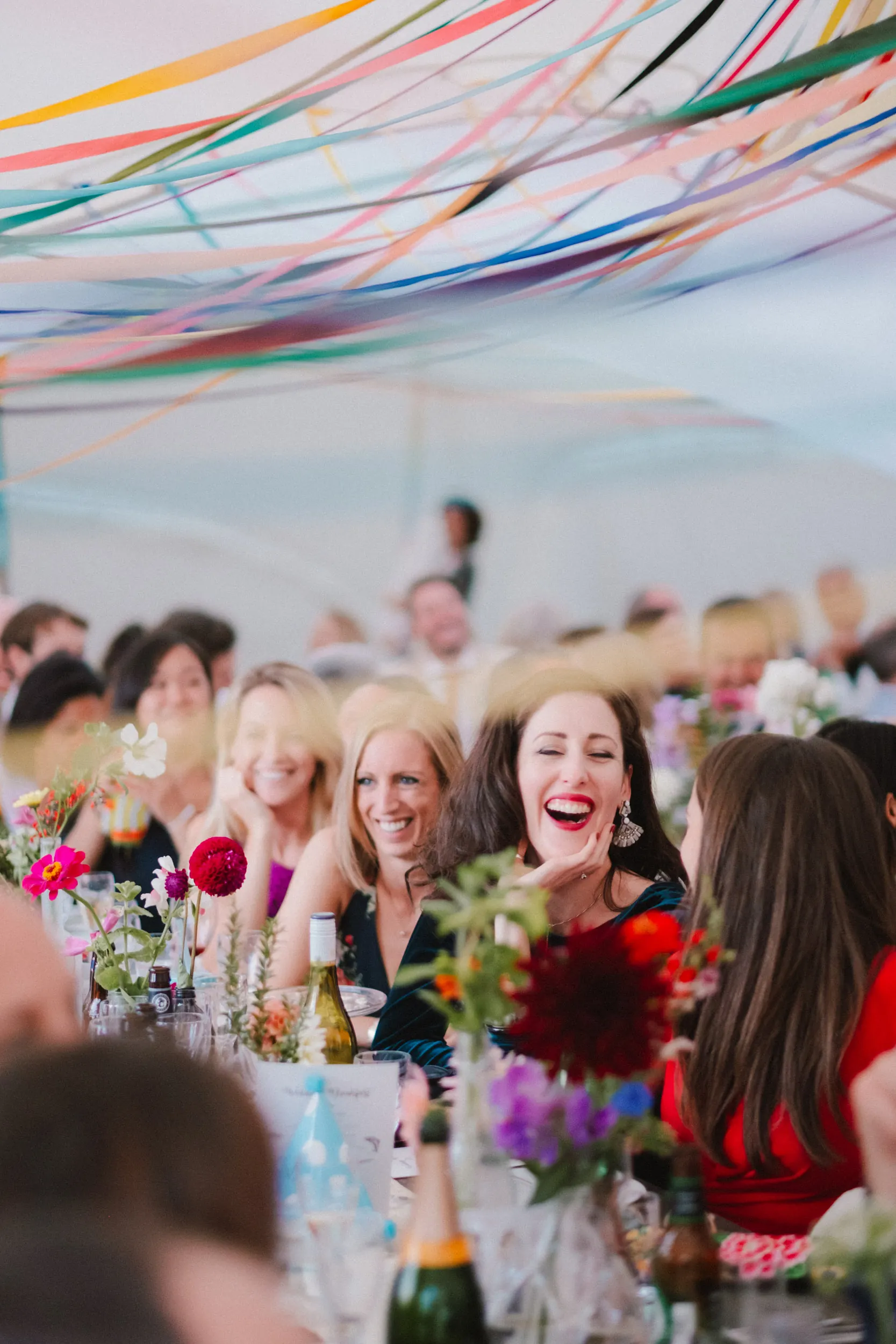 guests laughing during speeches at exclusive woodland wedding venue paper mill kent