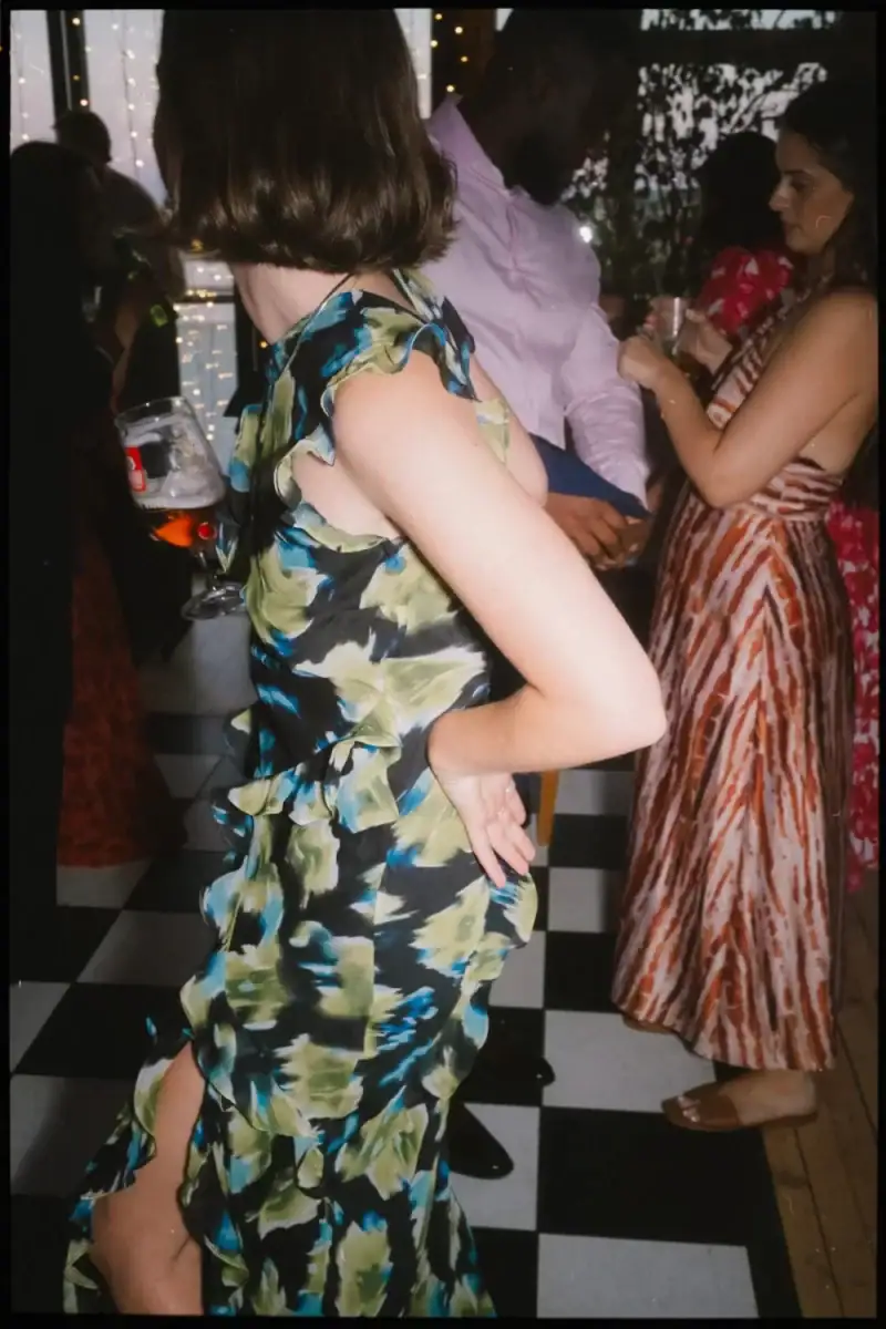 Wedding guest dancing during the evening reception at Greenwich Yacht Club in London.