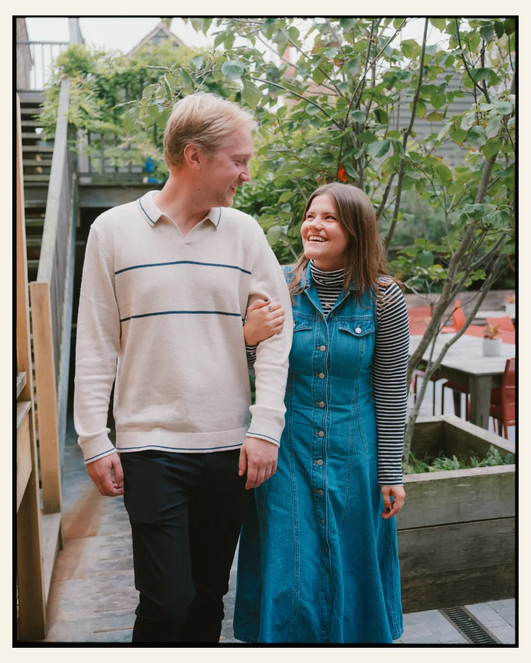 american couple at the george in rye for their engagement shoot ahead of their destination wedding