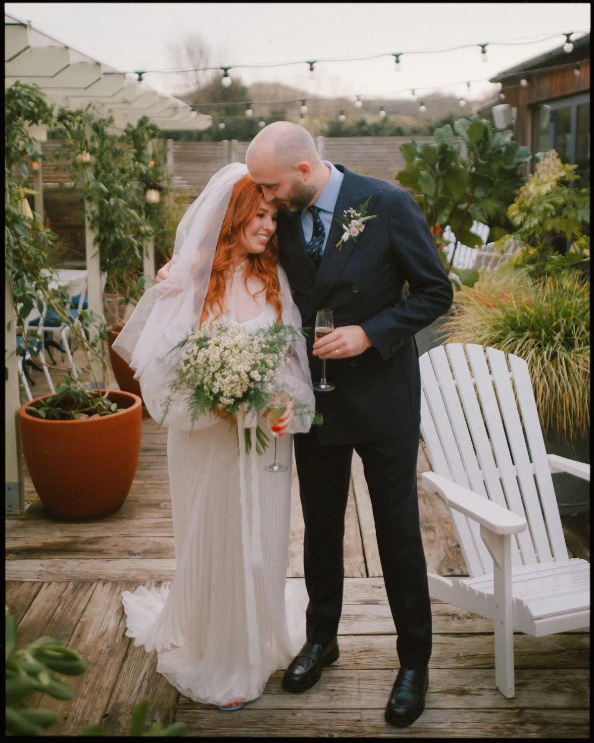 the gallivant wedding photographer rye sussex - couple in the garden