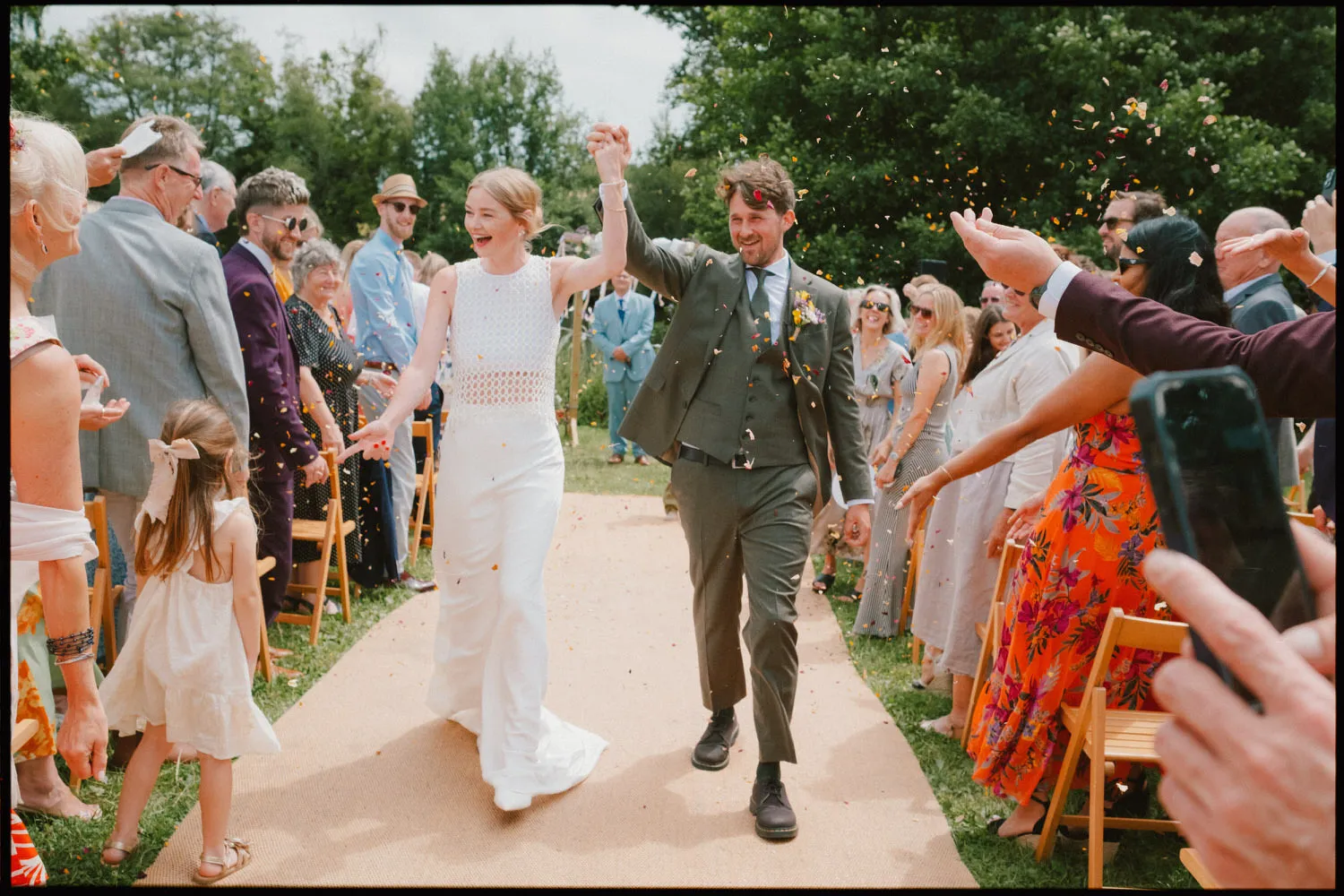 frickley lake wedding photographer sussex - bride and groom confetti