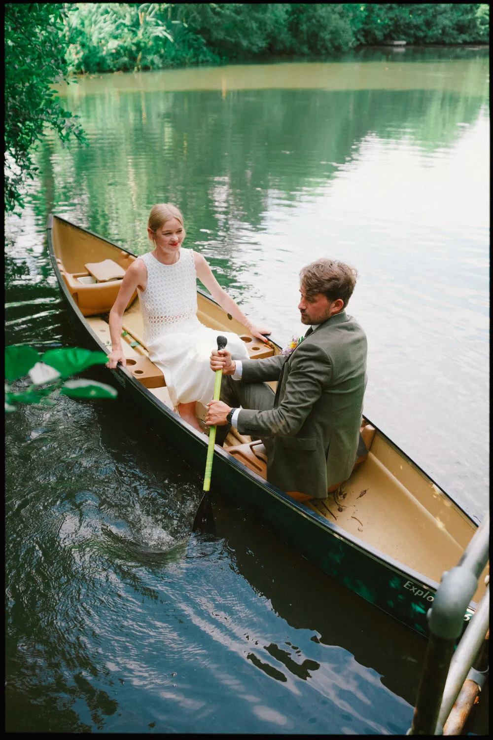 frickley lake wedding photographer sussex - couple in canoe on lake