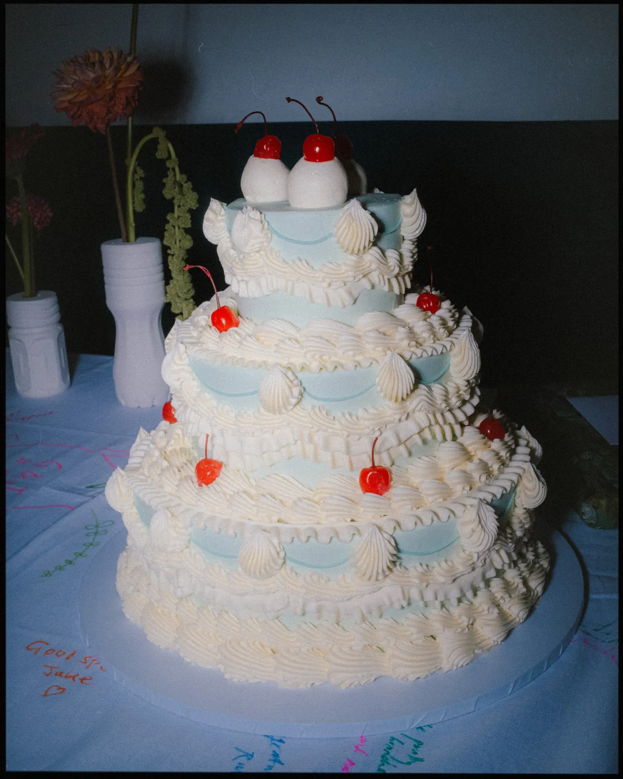 camberwell arms wedding photographer london - big blue decorated vintage wedding cake cherries