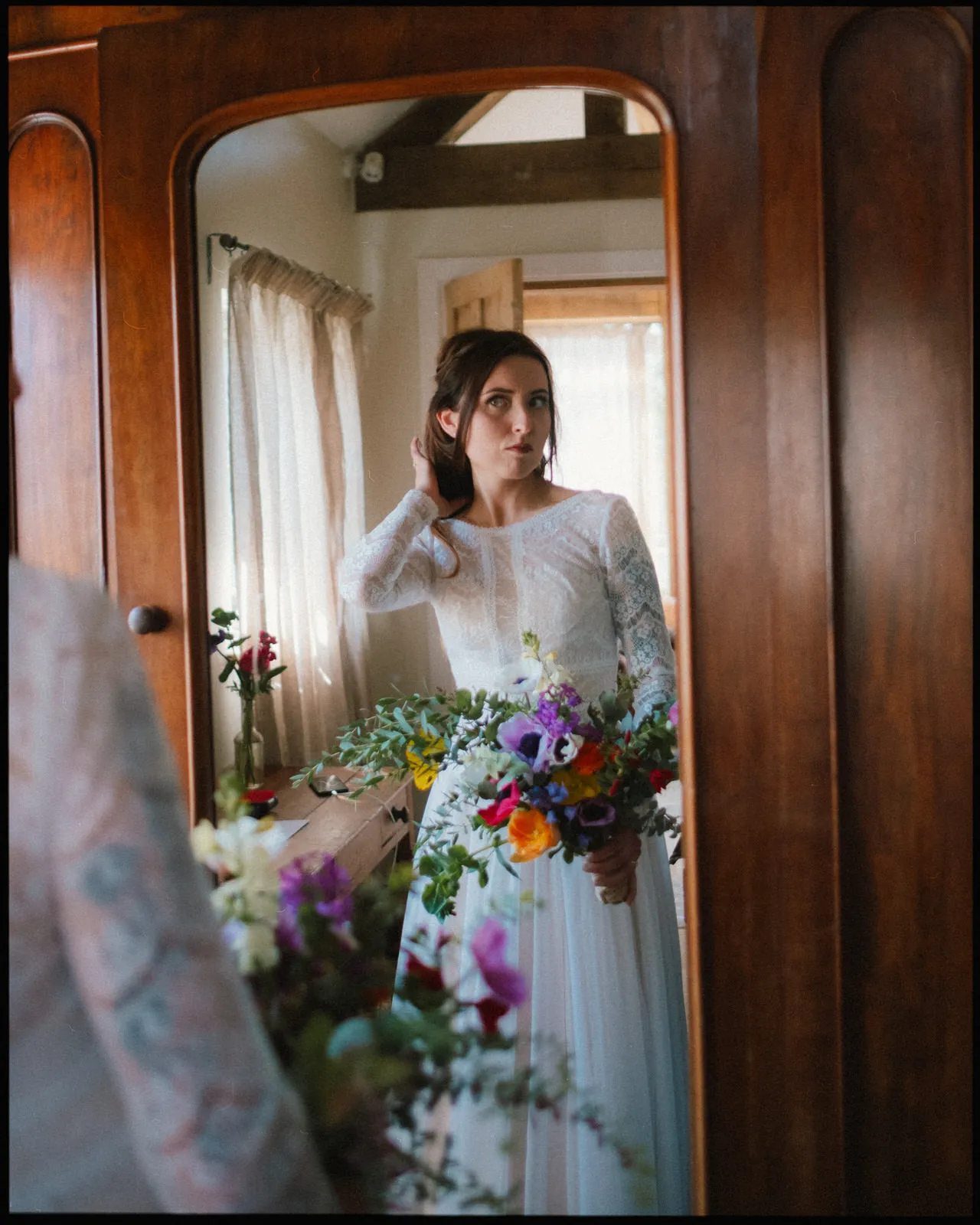 nancarrow farm wedding photographer cornwall - bride getting ready in mirror