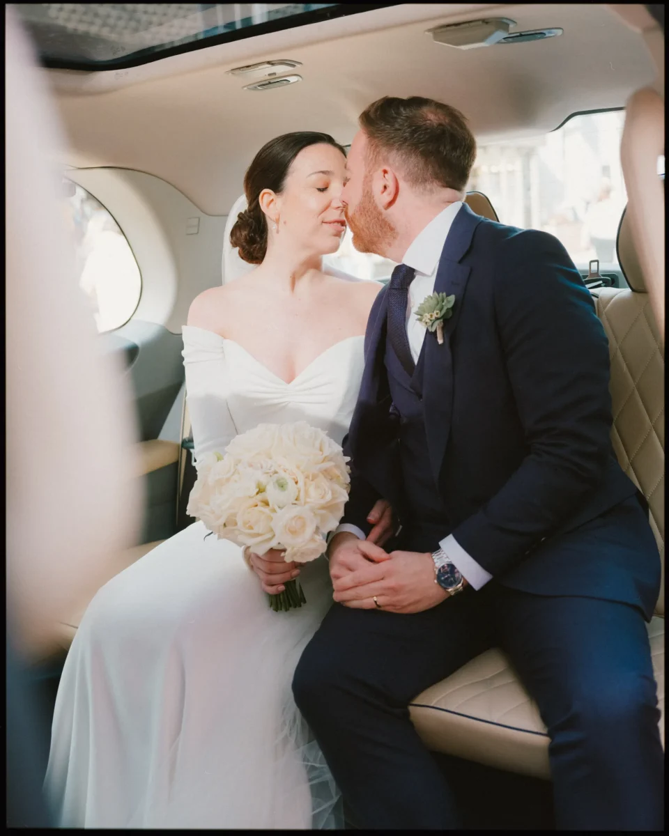 george in rye wedding photographer bride and groom kissing in the car