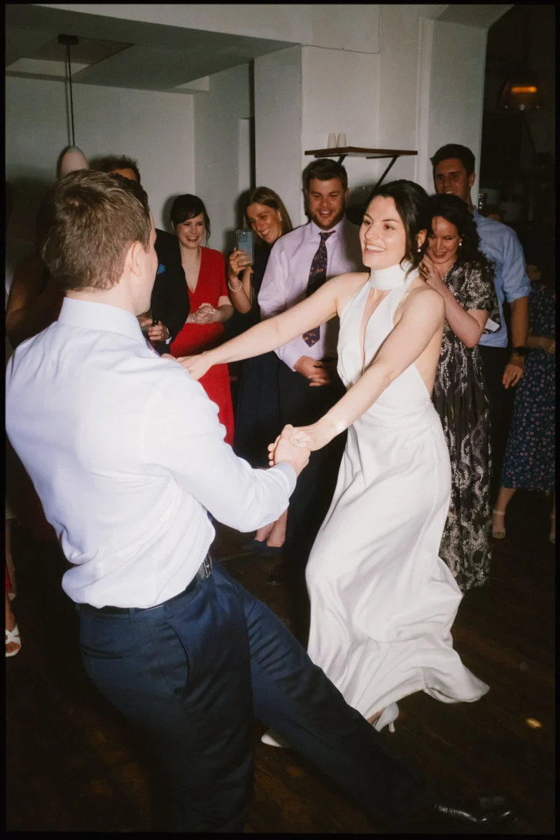 camberwell arms wedding - bride and groom swinging dancing